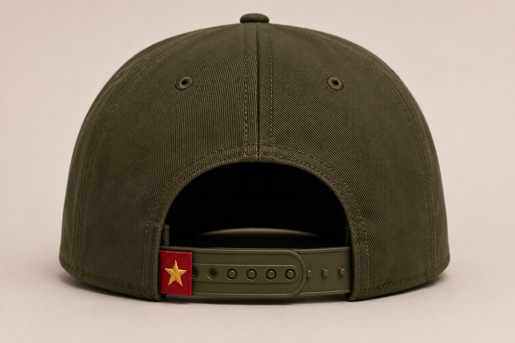Dinksyland THE NEW G — back view showing snapback closure and red star flag tag